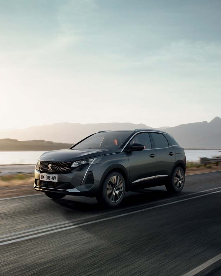 PEUGEOT 3008 SUV on a main road