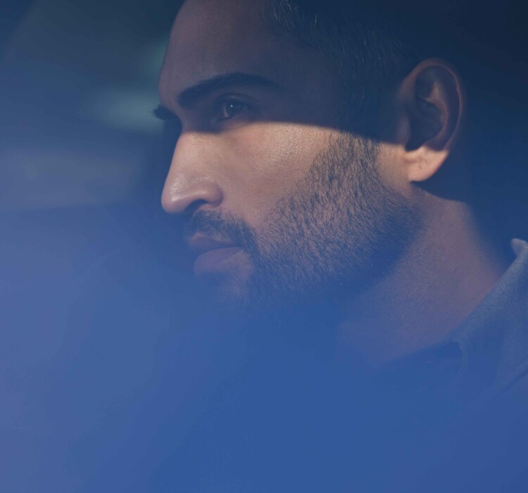 Man on board a Peugeot vehicle